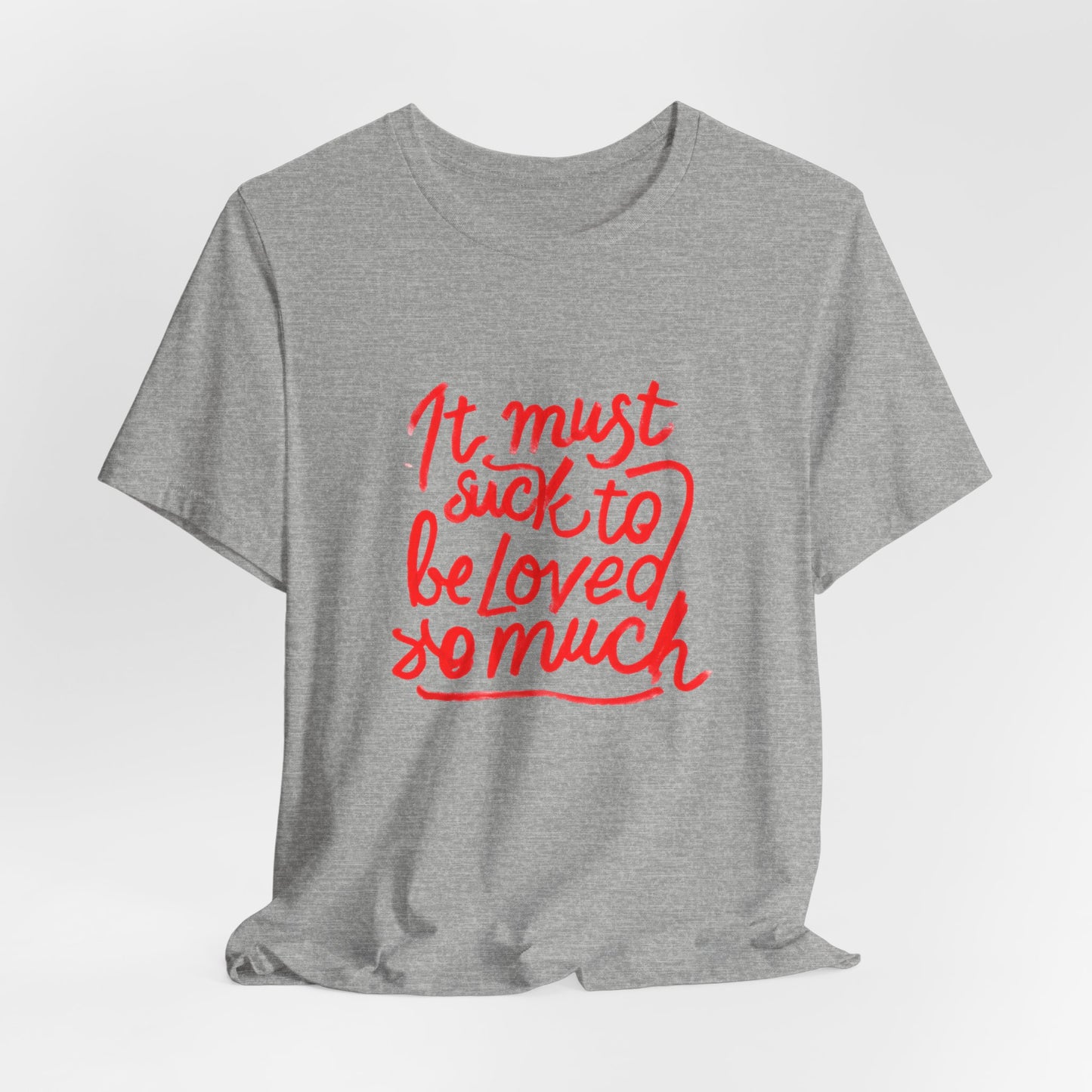 T‑Shirt — “It Must Suck to Be Loved So Much” Red Script Tee
