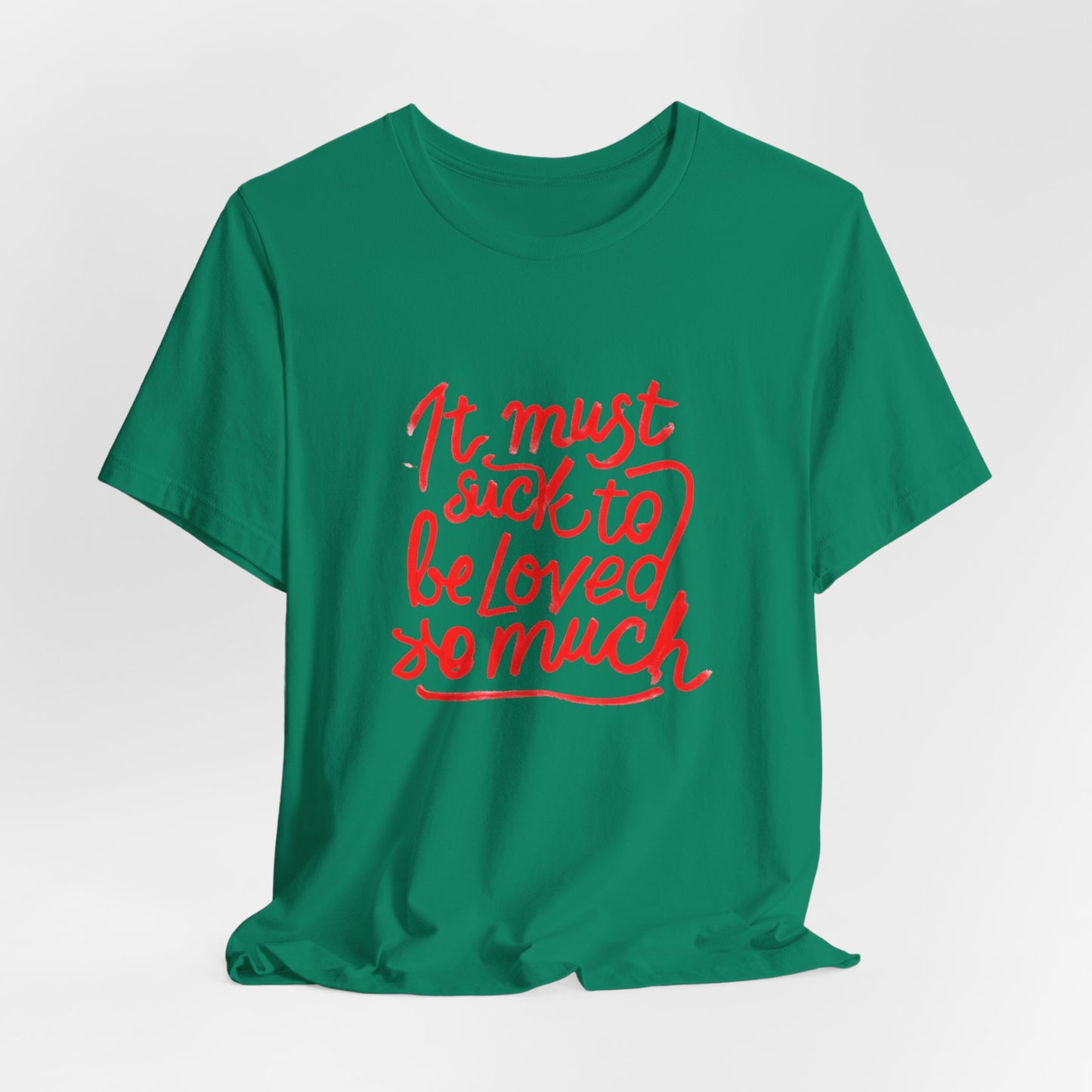T‑Shirt — “It Must Suck to Be Loved So Much” Red Script Tee